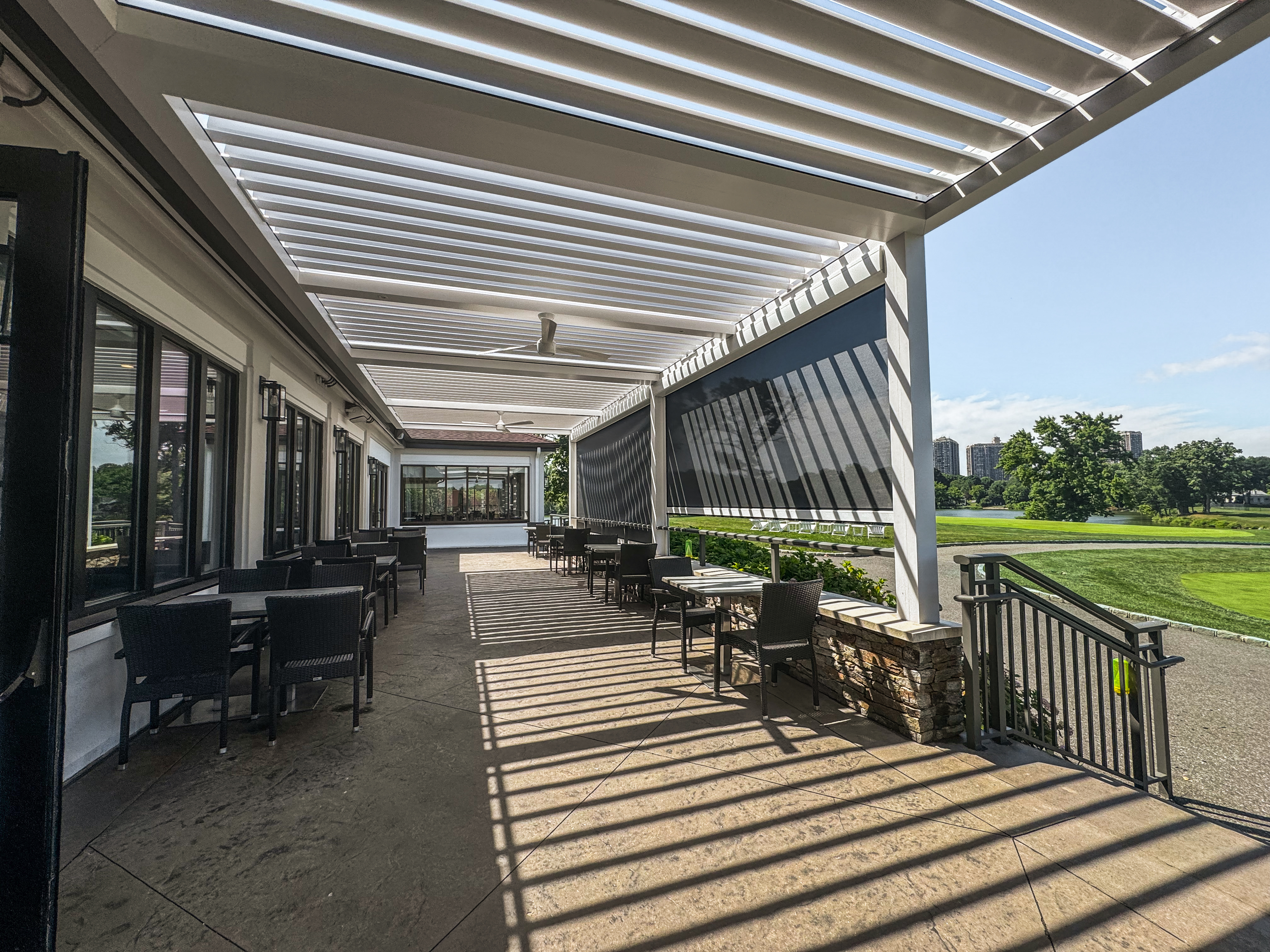 Lake Success Country Club member dining terrace under the Breslow motorized louvered roof