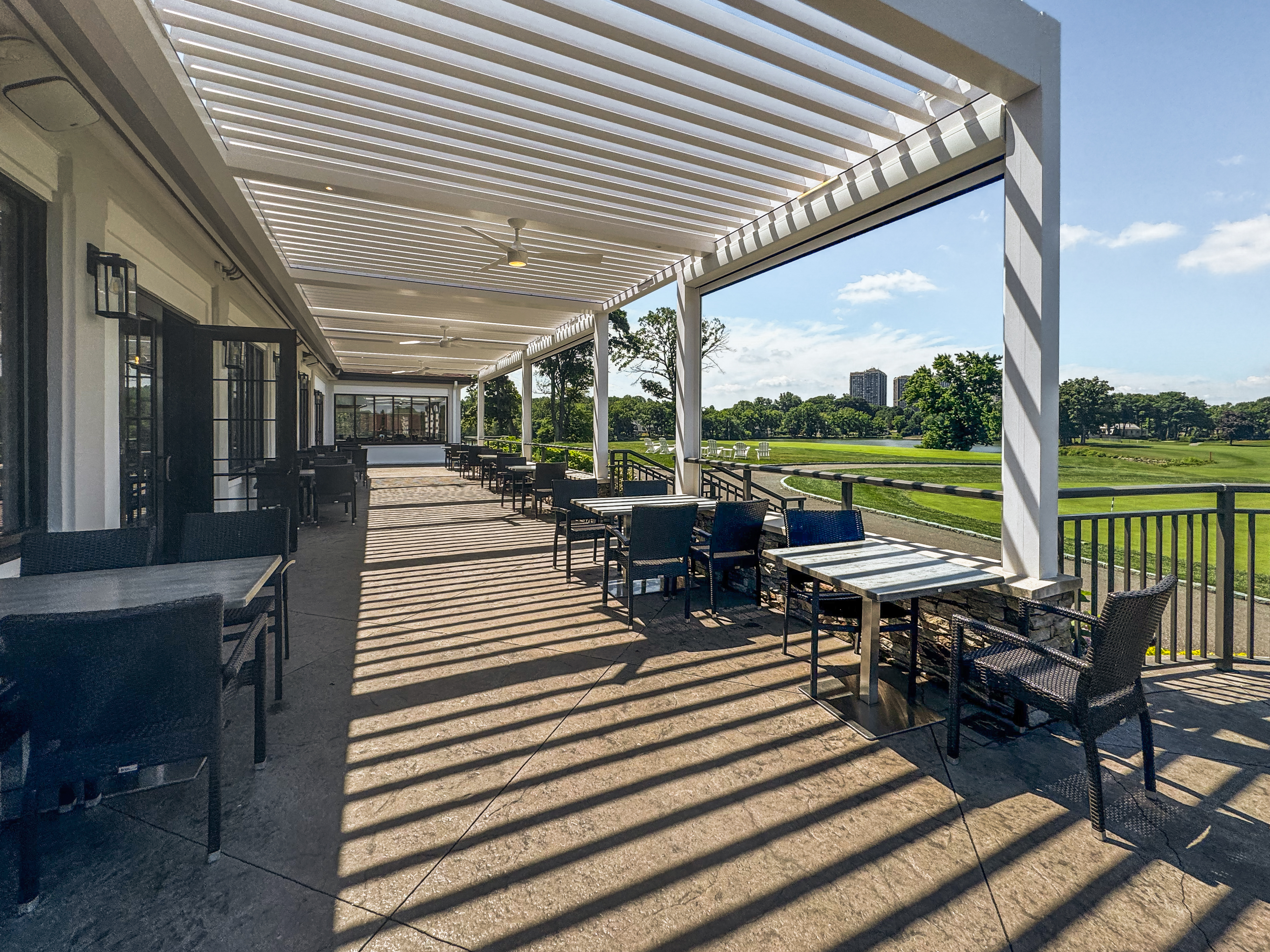 Completed installation of Breslow R-Blade motorized louvered roof at Lake Success Country Club
