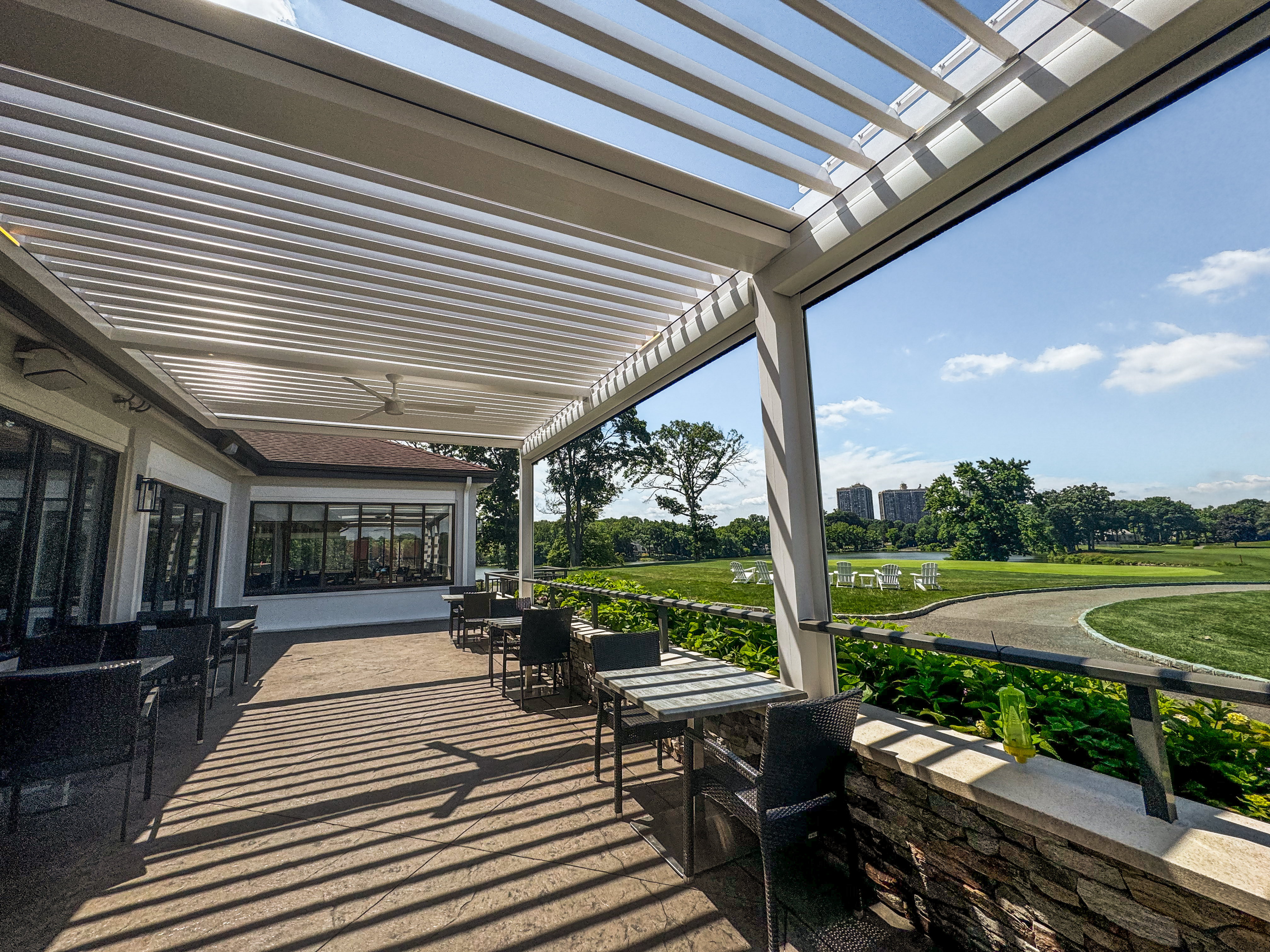 Evening view of the Breslow-installed outdoor dining structure at Lake Success