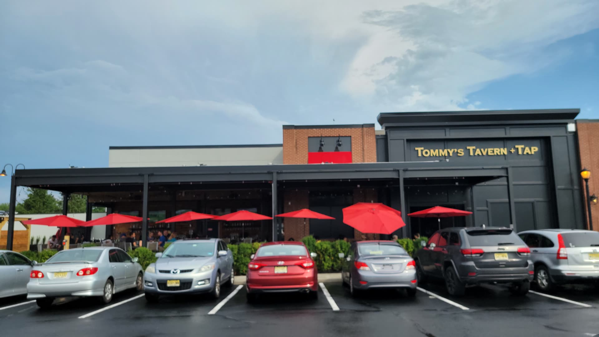 Tommy's Tavern + Tap Clifton — outdoor dining structure by Breslow