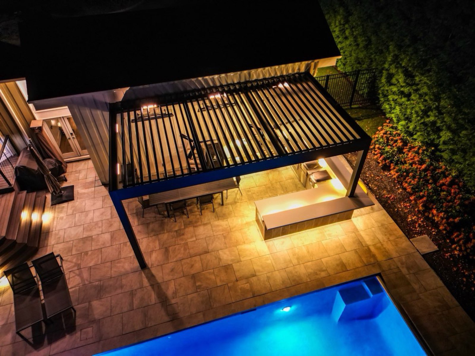 Aerial louvered pergola installation