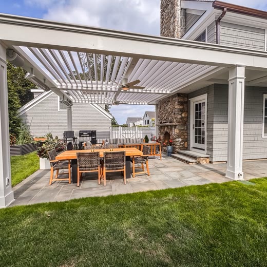 Custom transitional-style pergola matching the home’s architecture — New Canaan, CT