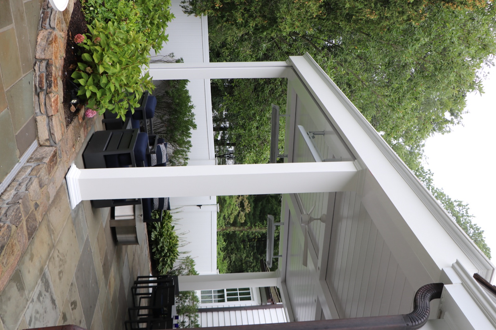 Transitional louvered roof pergola in Darien, CT