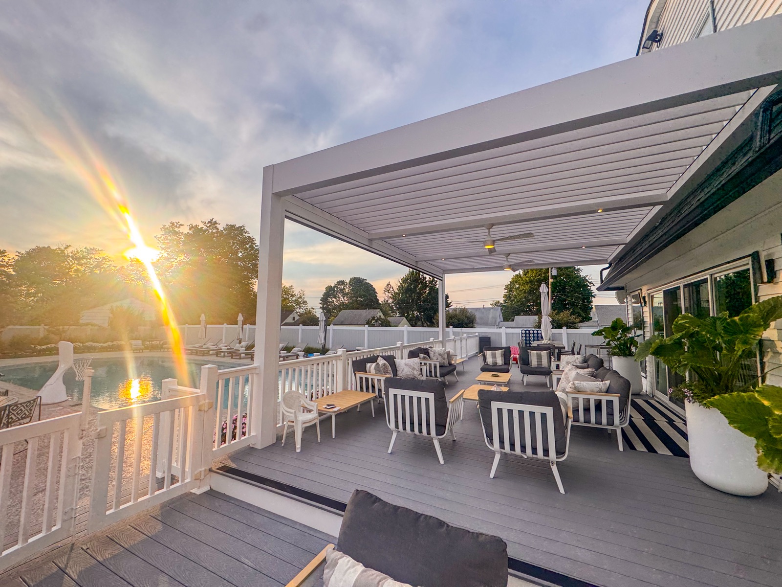 Long Branch, NJ modern poolside pergola — motorized retractable shade — detail view