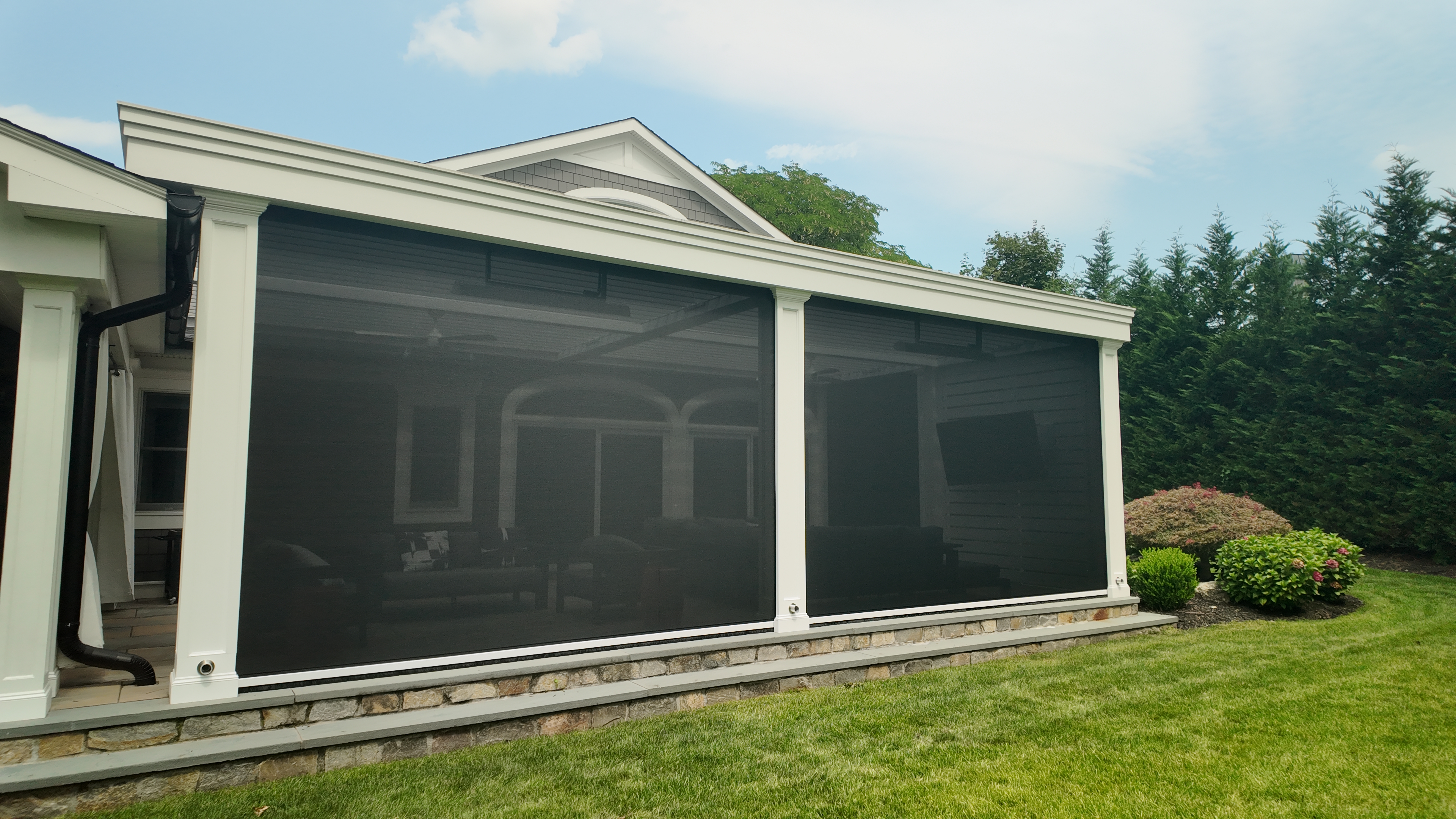Custom Transitional Column Azenco Motorized Pergola with Concealed Motorized Screen shades, and Privacy wall with a TV mount, Manhasset NY