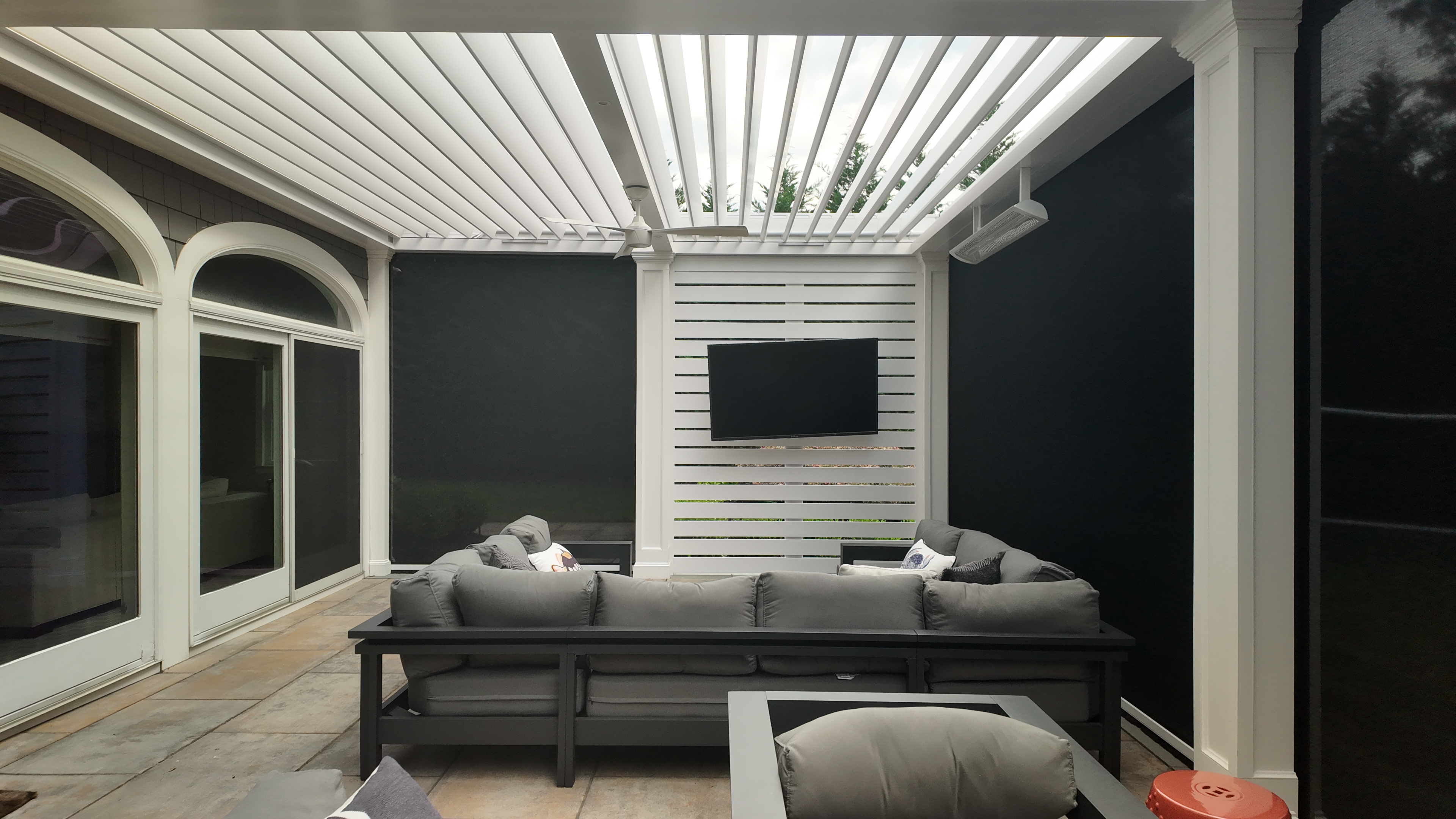 Custom Transitional Column Azenco Motorized Pergola with Concealed Motorized Screen shades, and Privacy wall with a TV mount, Manhasset NY