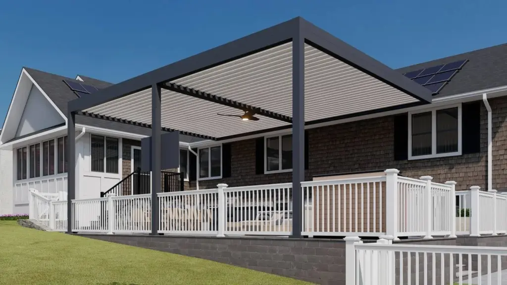 A sleek, modern louvered pergola installed over a backyard patio area, attached to a residential home with white fencing and outdoor seating.