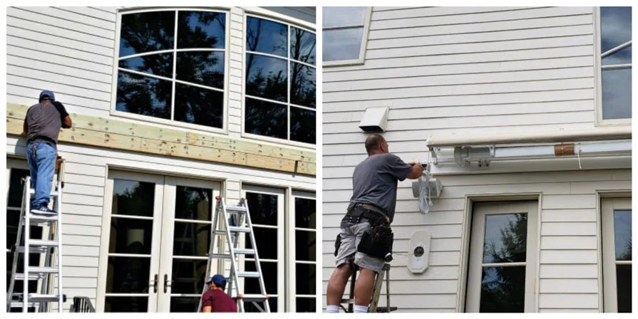 Technicians on ladders installing mounting brackets and framework for a retractable awning on the exterior wall of a house.