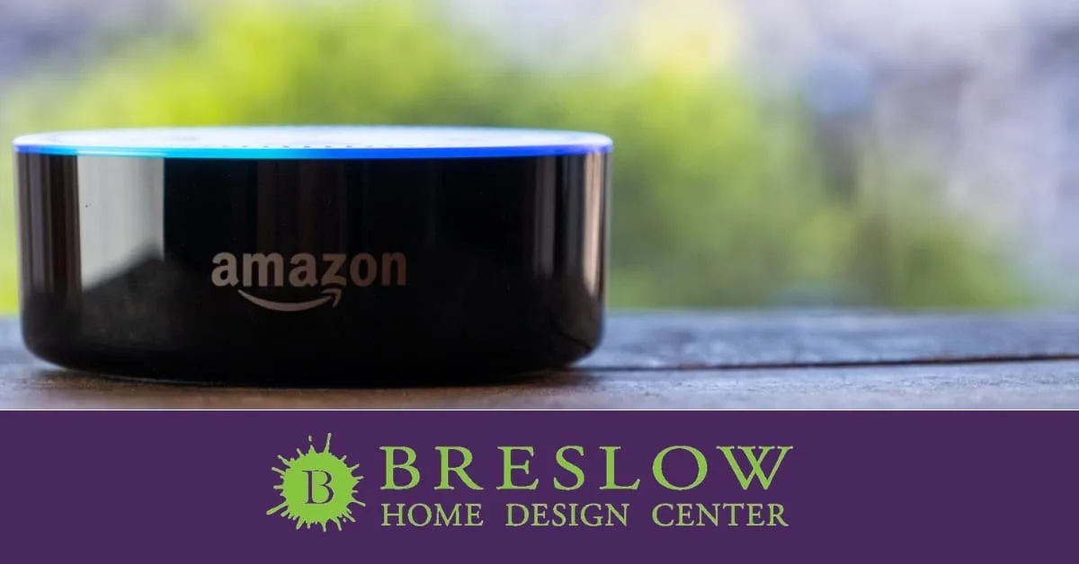 Amazon Echo smart speaker displayed with the Breslow Home Design Center logo in the foreground.